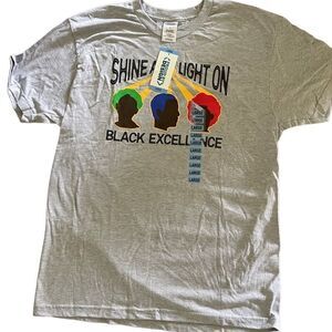 Proud by Design unisex Tee made in USA ! “Shine a light on black excellence “